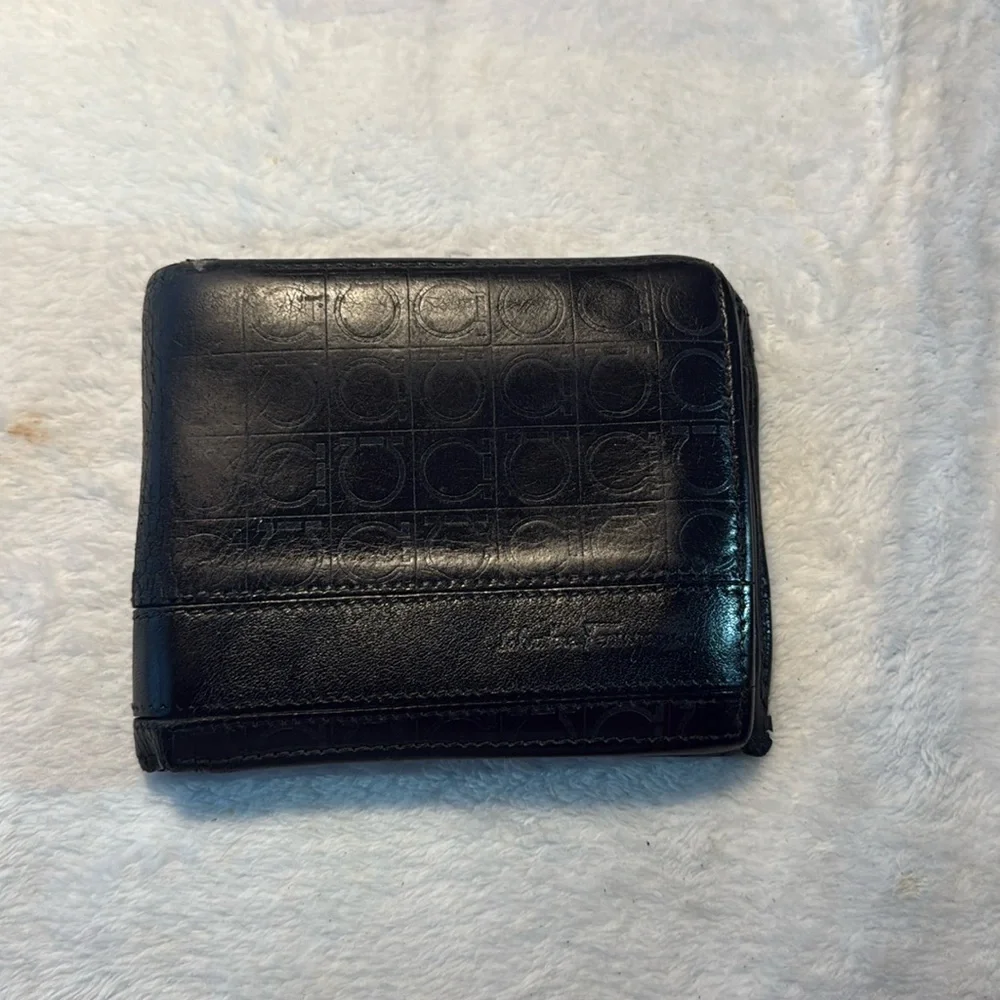 Salvador Ferragamo black bifold wallet.